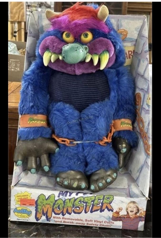 Original 1986 My Pet Monster in its box with the removable vinyl cuffs and break-away chain — a highly collectible piece